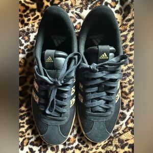 Adidas Women’s Black and Gold animal print Sneakers